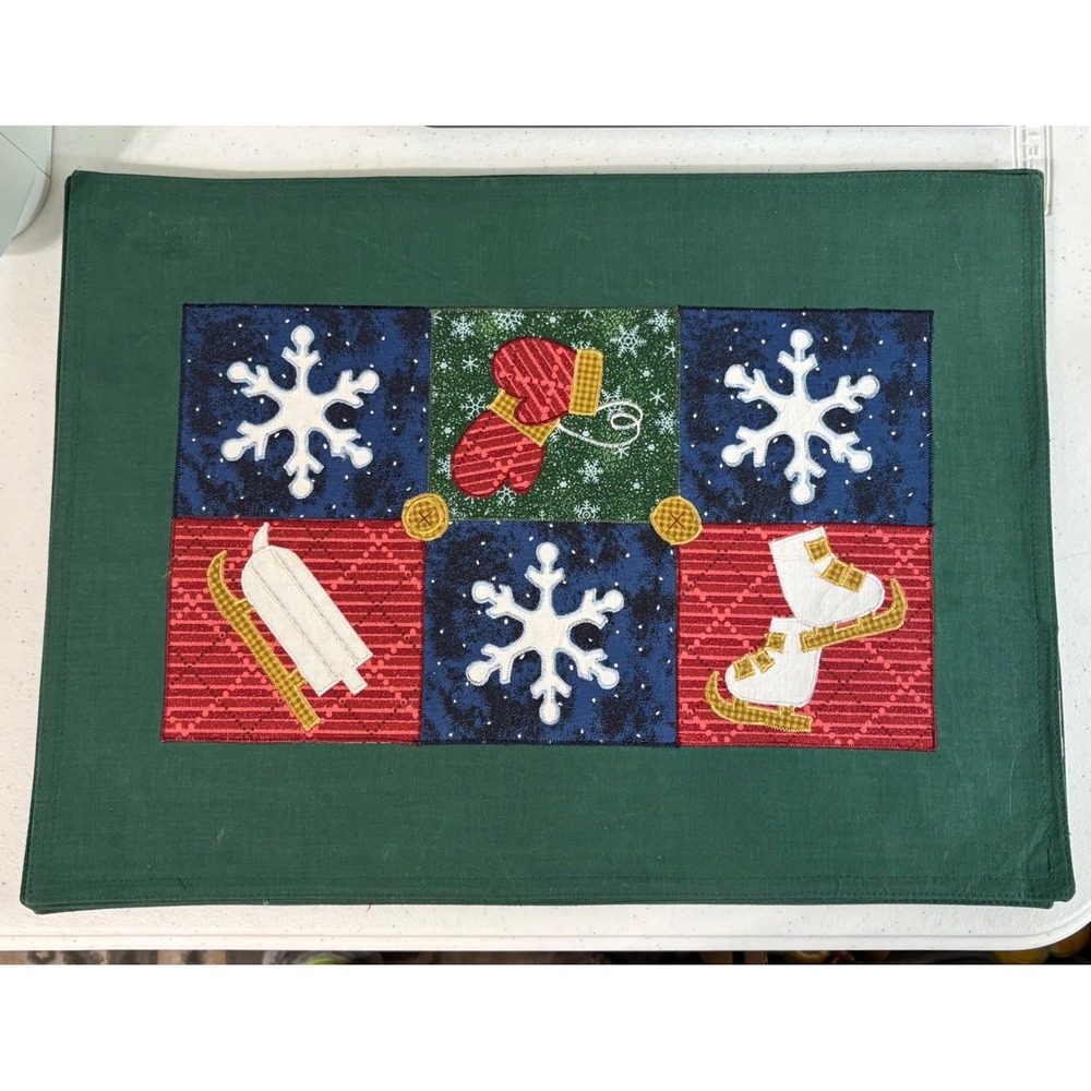 Vintage Winter Holiday Placemat Green Applique Snowflake Mittens Ice Skates Sled